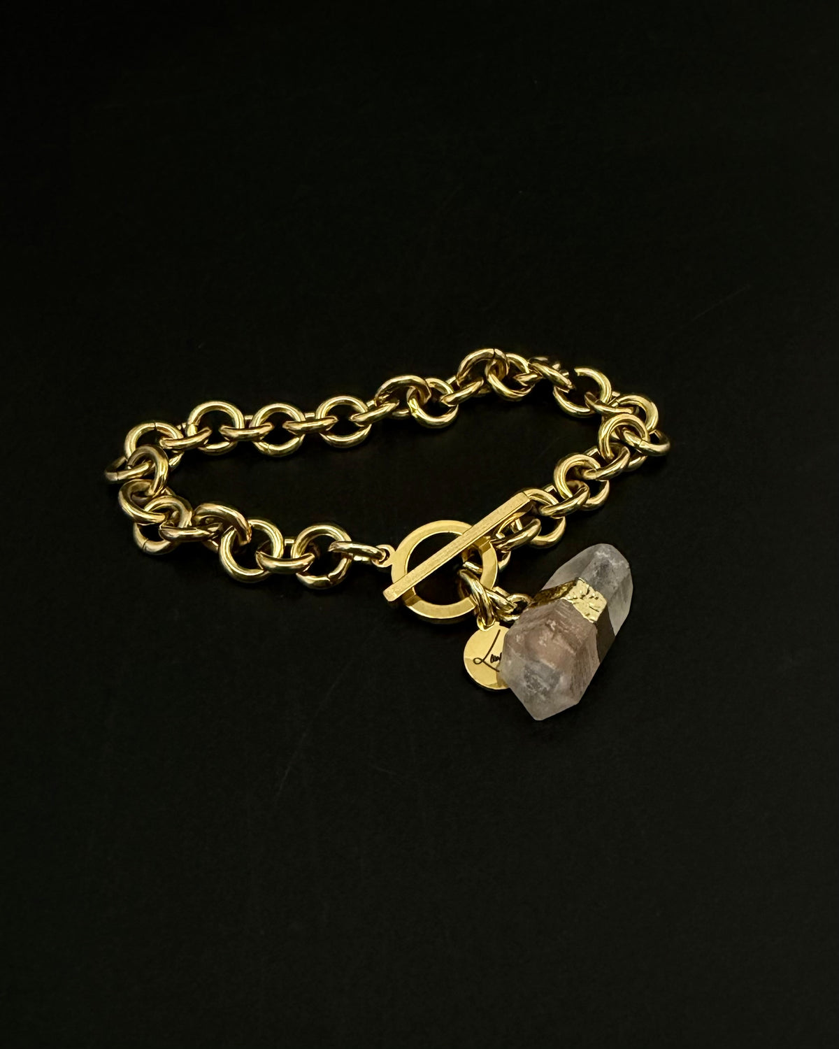 Gold-plated stainless steel chain bracelet with raw clear quartz crystal detail on an 8 mm chain and toggle clasp, Athena Axiom Bracelet by Lawless Jewellery.