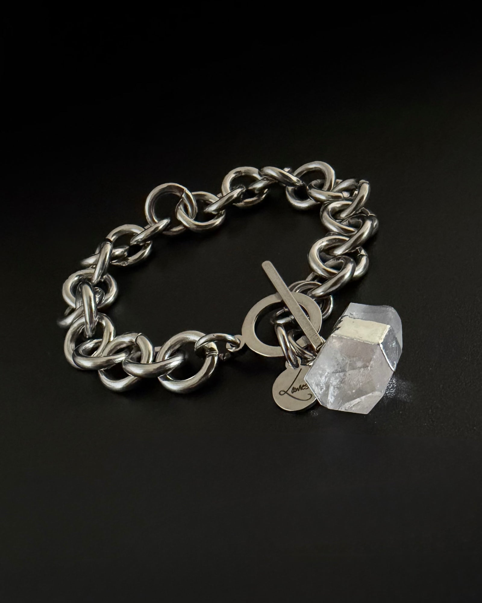 Silver stainless steel chain bracelet with raw clear quartz crystal detail and toggle clasp, Athena Axiom Bracelet by Lawless Jewellery.