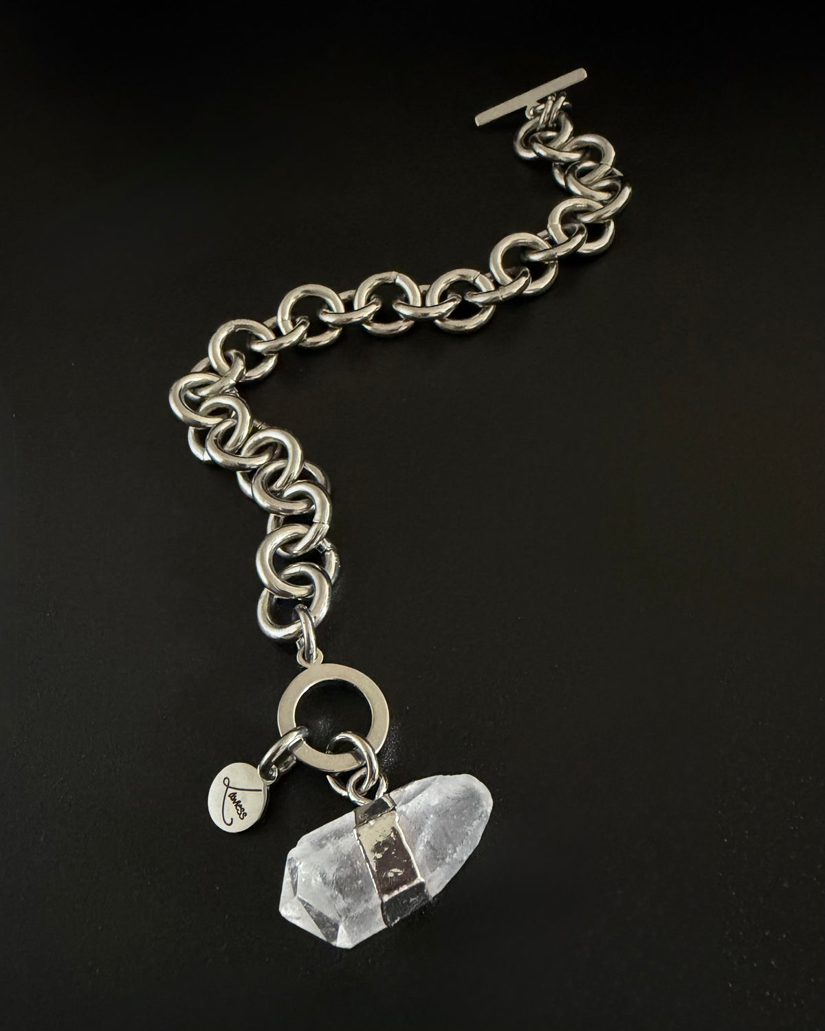 Silver stainless steel chain bracelet with raw clear quartz crystal detail and toggle clasp, Athena Axiom Bracelet by Lawless Jewellery.