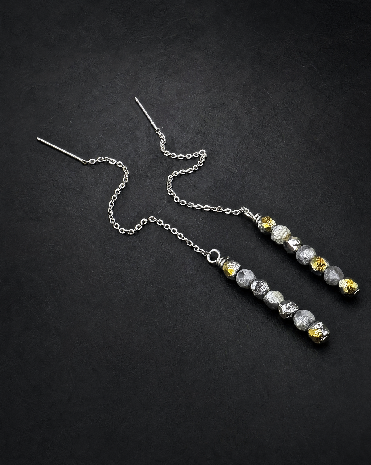 Pair of silver Eos Threshold Ear Threader Earrings with fine adjustable chains and faceted glass beads in mixed gold and silver tones.