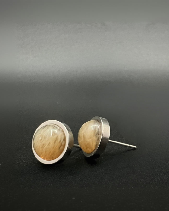 Stainless steel stud earrings with domed yellow-orange watermelon glass cabochons, 10 mm studs with 8 mm cabochons by Lawless Jewellery Ireland.