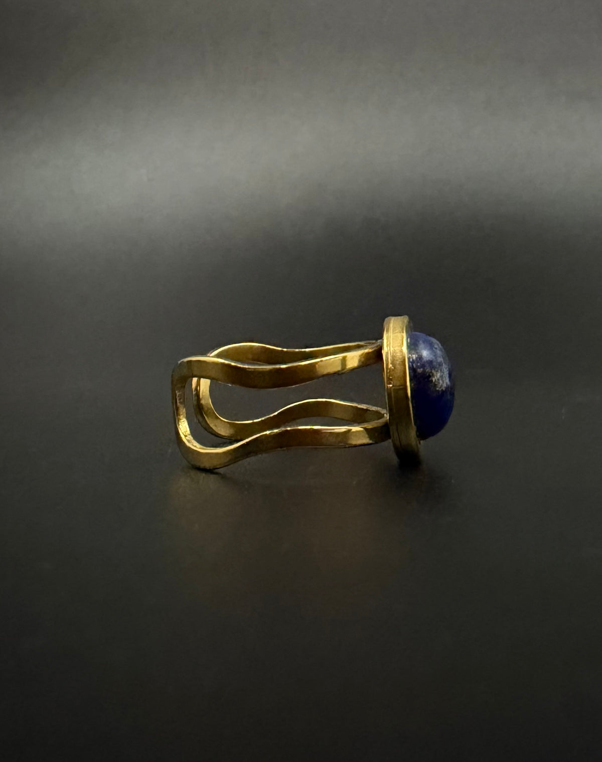 Nebulae Core adjustable ring in stainless steel featuring a 10mm lapis lazuli gemstone disc with deep blue and gold flecked detailing
