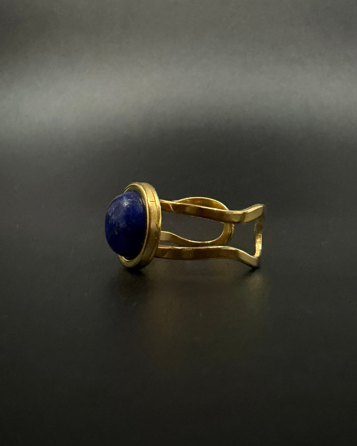 Nebulae Core adjustable ring in stainless steel featuring a 10mm lapis lazuli gemstone disc with deep blue and gold flecked detailing