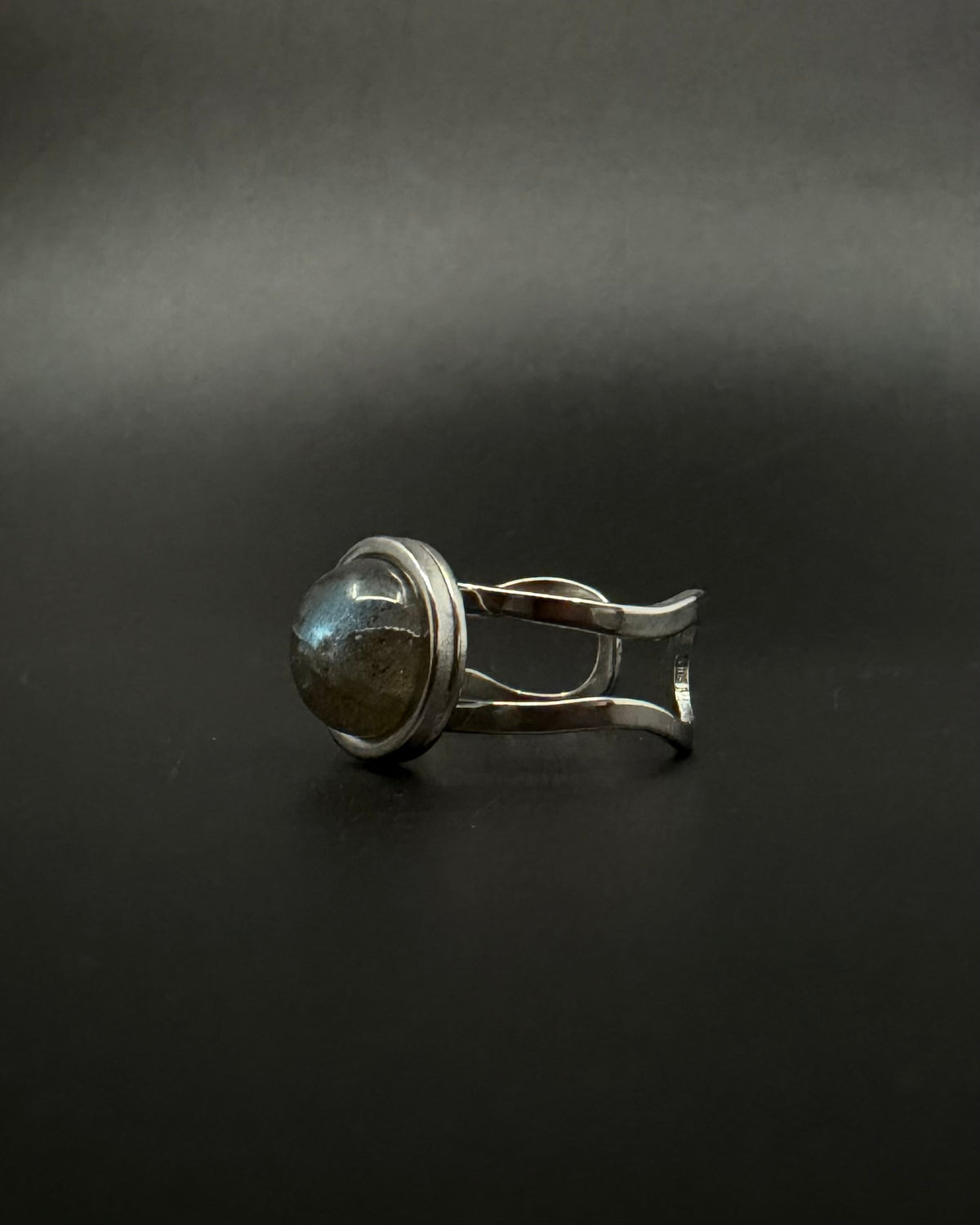 Silver adjustable double-shank ring with domed 10 mm labradorite gemstone showing blue and grey flashes, Nebulae Core Ring by Lawless Jewellery