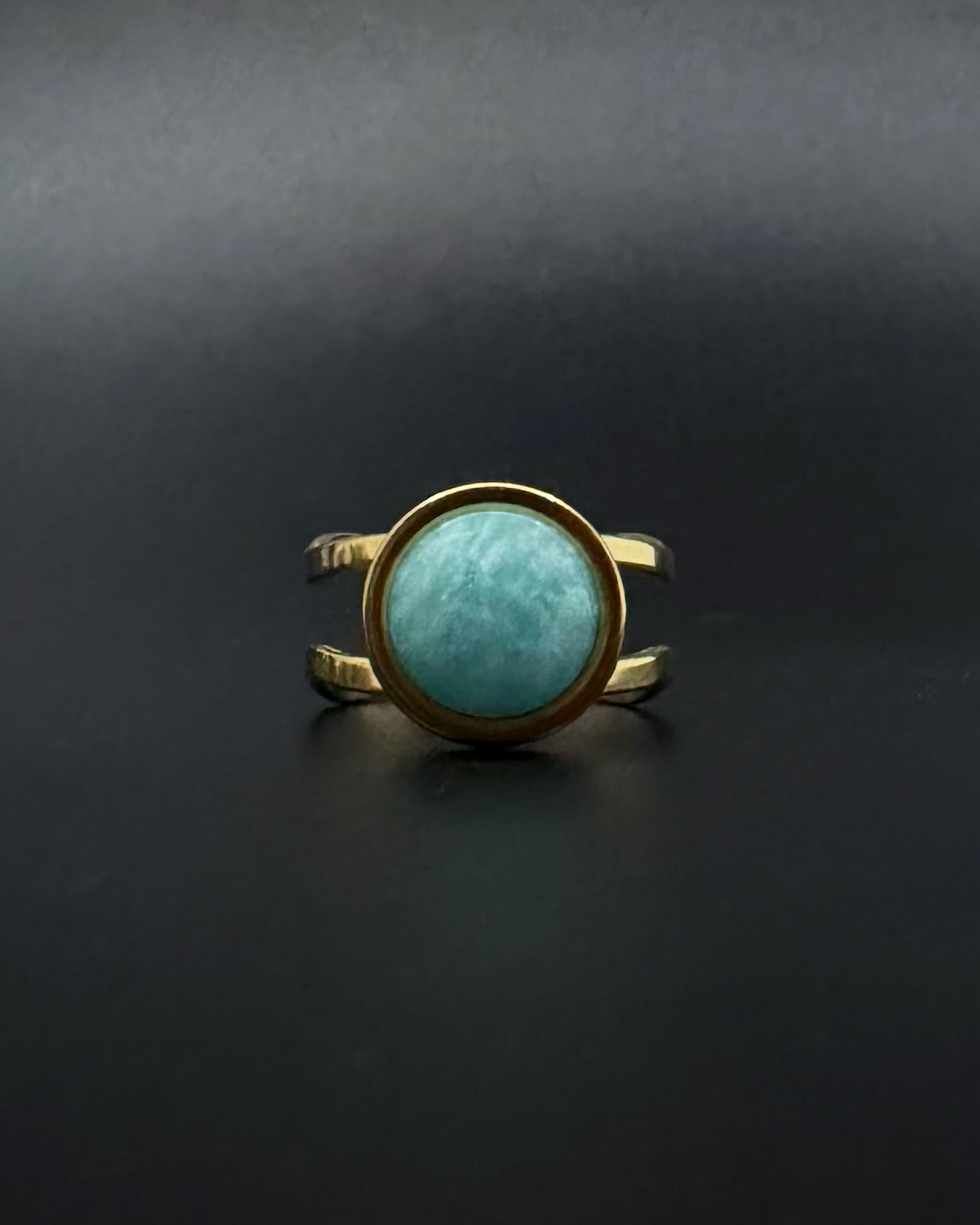 Silver adjustable double-shank ring with domed 10 mm amazonite gemstone in soft blue-green tones, Nebulae Core Ring by Lawless Jewellery.