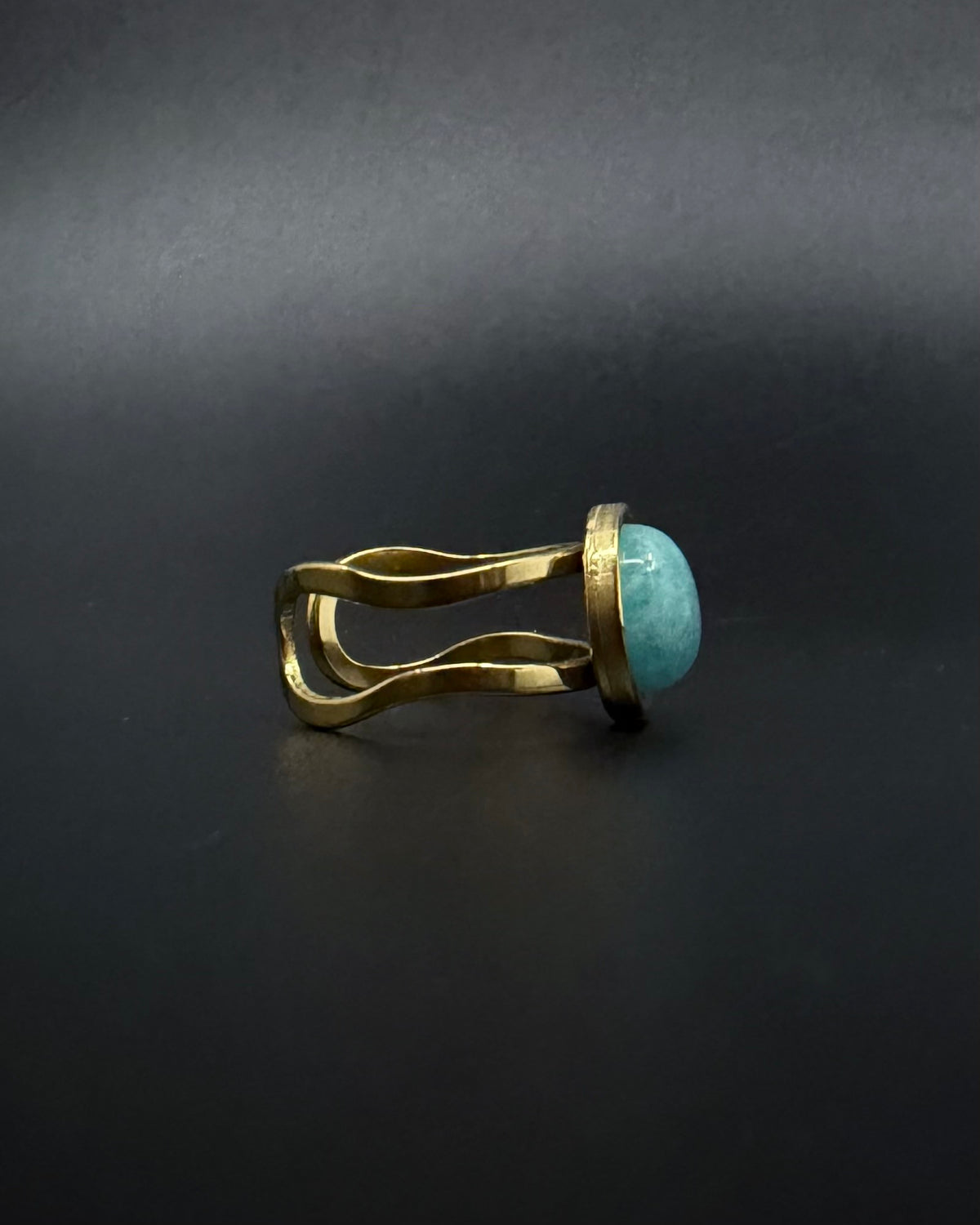 Silver adjustable double-shank ring with domed 10 mm amazonite gemstone in soft blue-green tones, Nebulae Core Ring by Lawless Jewellery.