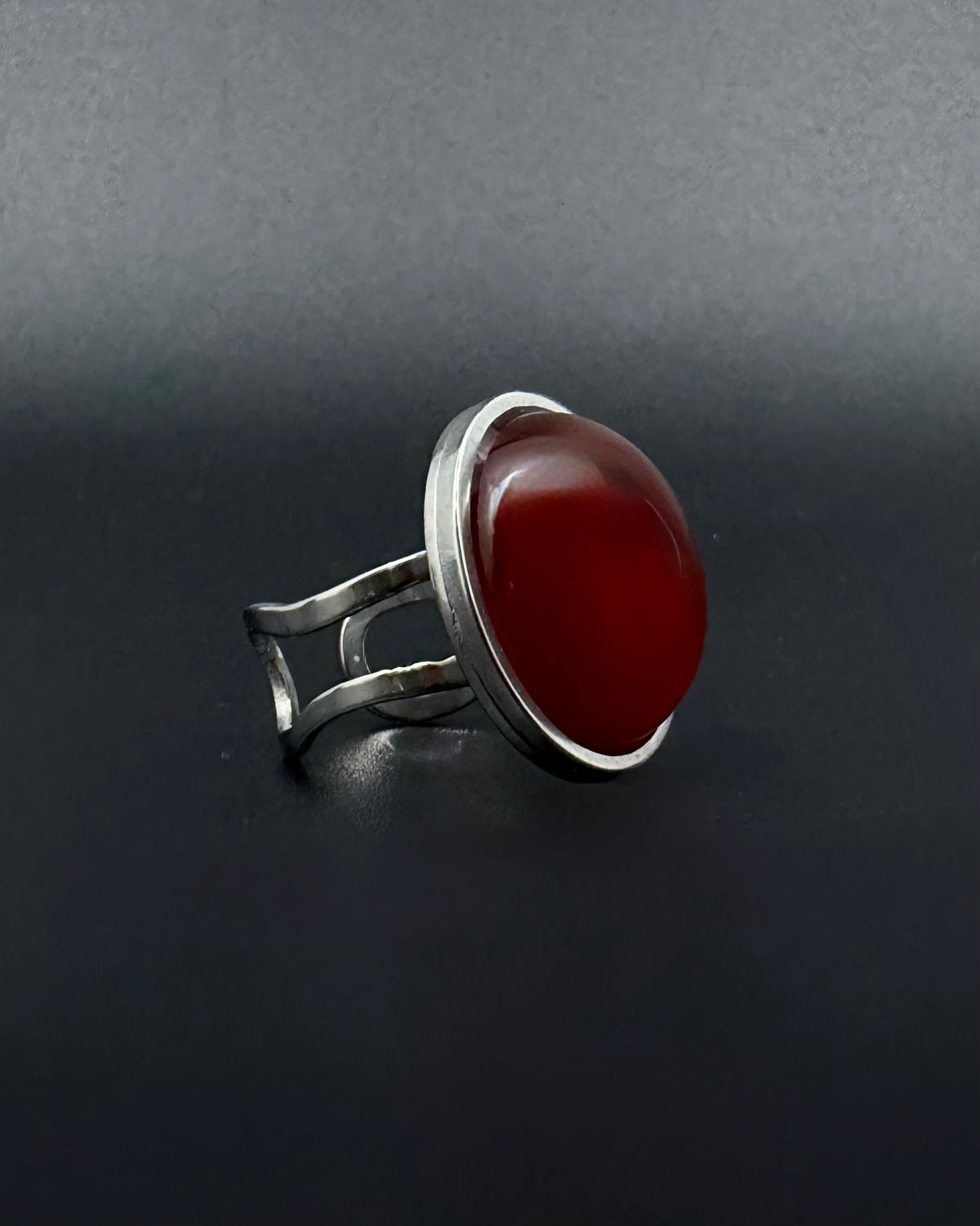 Silver adjustable statement ring with 20mm domed carnelian gemstone, double-shank stainless steel band, Nebulae Core Ring by Lawless Jewellery