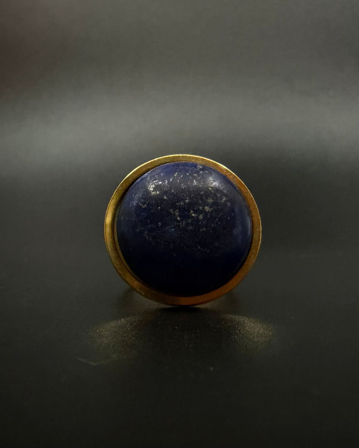 Nebulae Core adjustable ring in stainless steel featuring a 20mm lapis lazuli gemstone disc with deep blue and gold flecked detailing