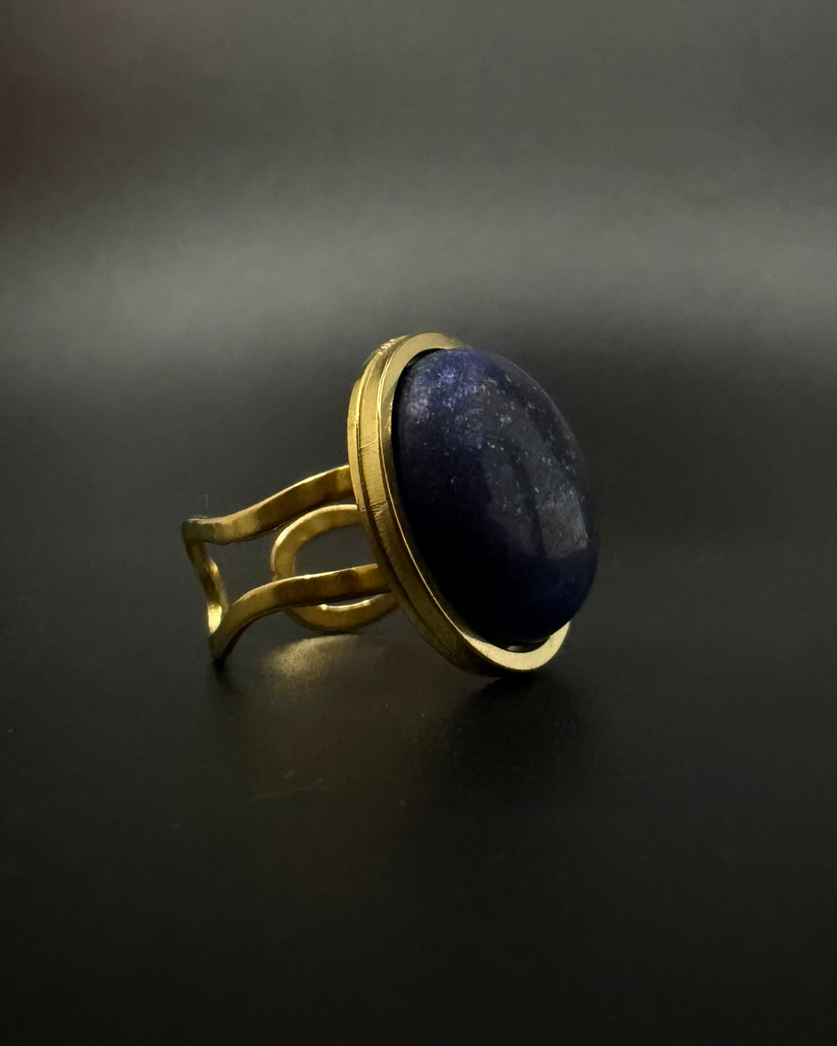 Nebulae Core adjustable ring in stainless steel featuring a 20mm lapis lazuli gemstone disc with deep blue and gold flecked detailing