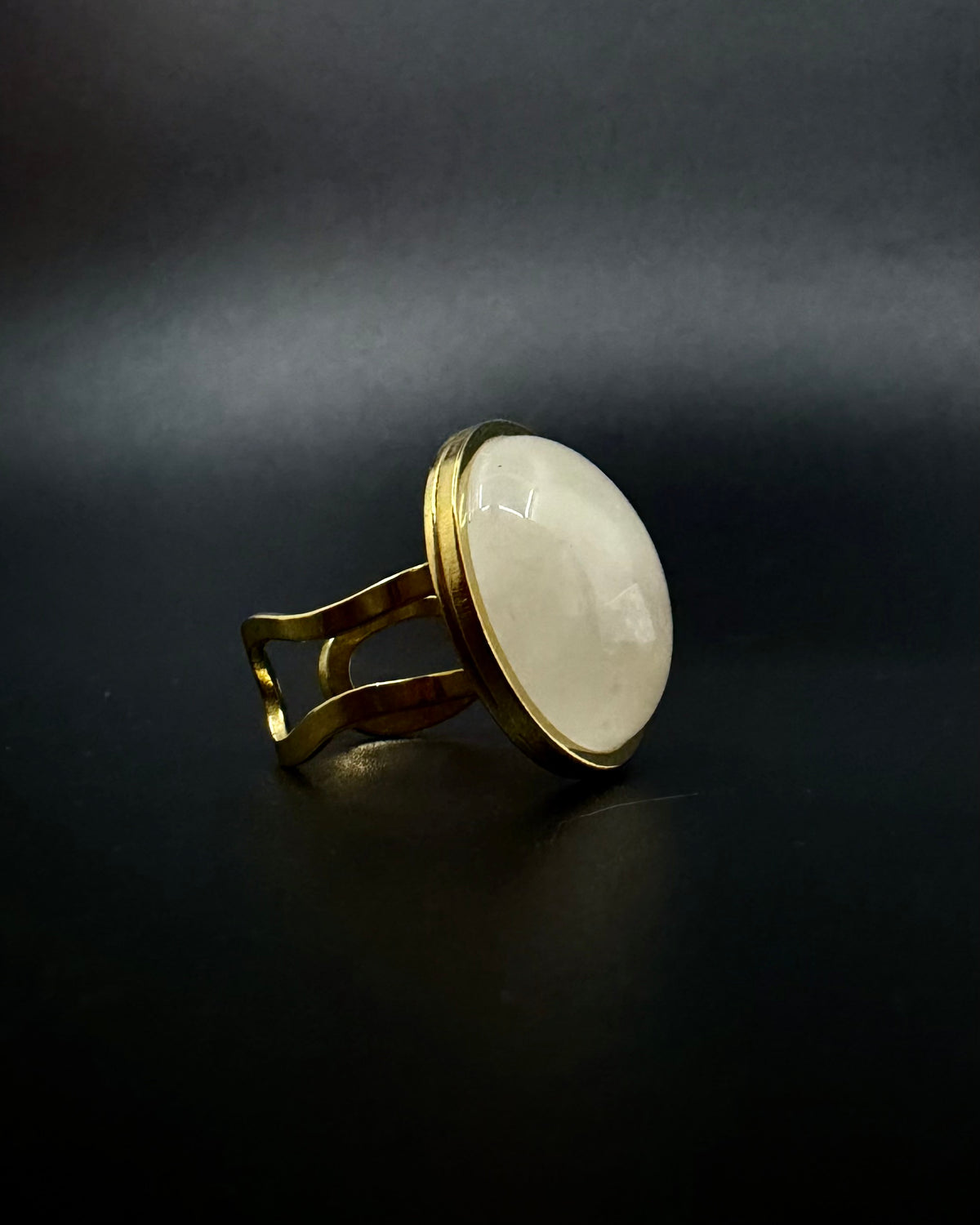 Gold adjustable statement ring with 20mm domed quartz crystal gemstone, double-shank stainless steel band, Nebulae Core Ring by Lawless Jewellery