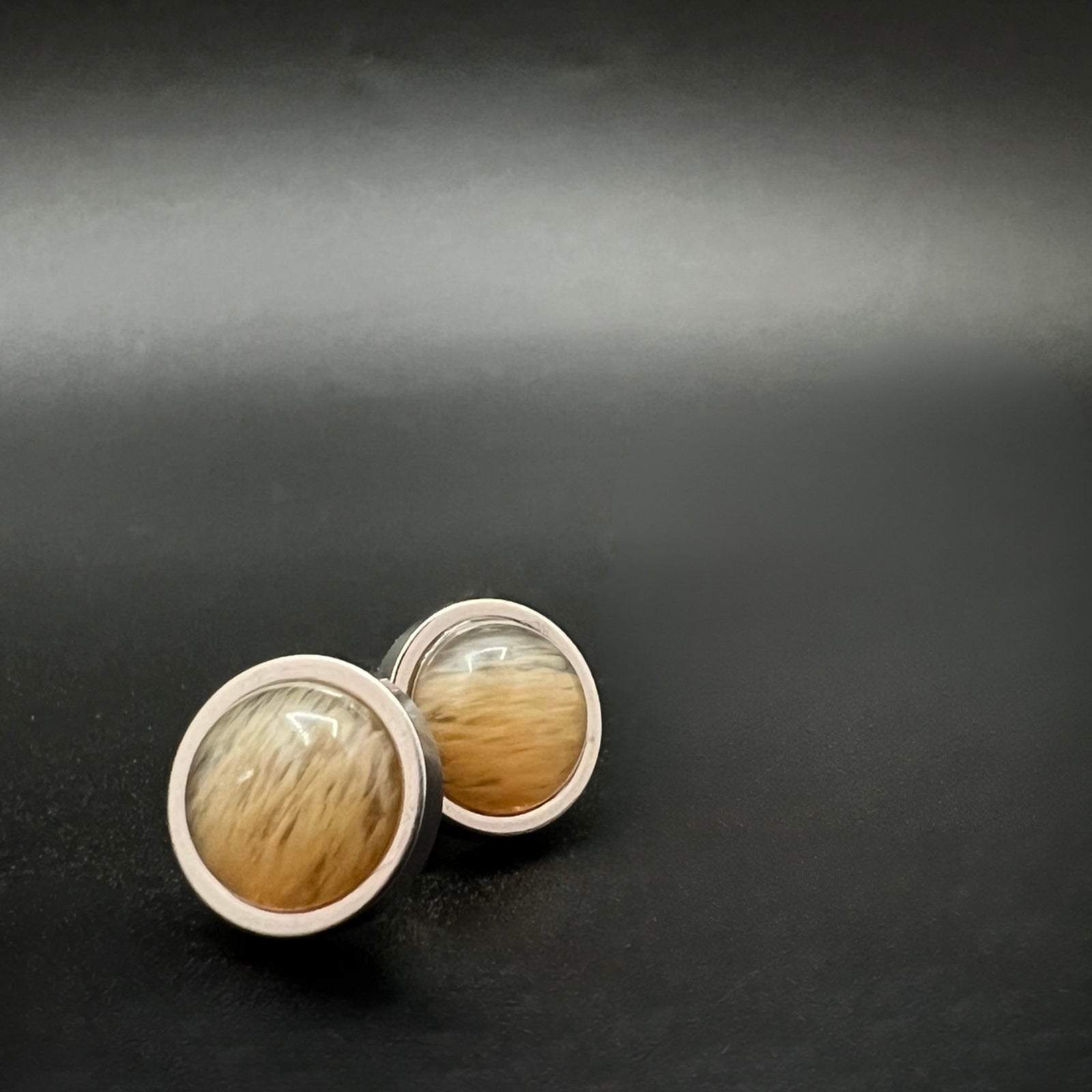 Stainless steel stud earrings with domed yellow-orange watermelon glass cabochons, 10 mm studs with 8 mm cabochons by Lawless Jewellery Ireland.