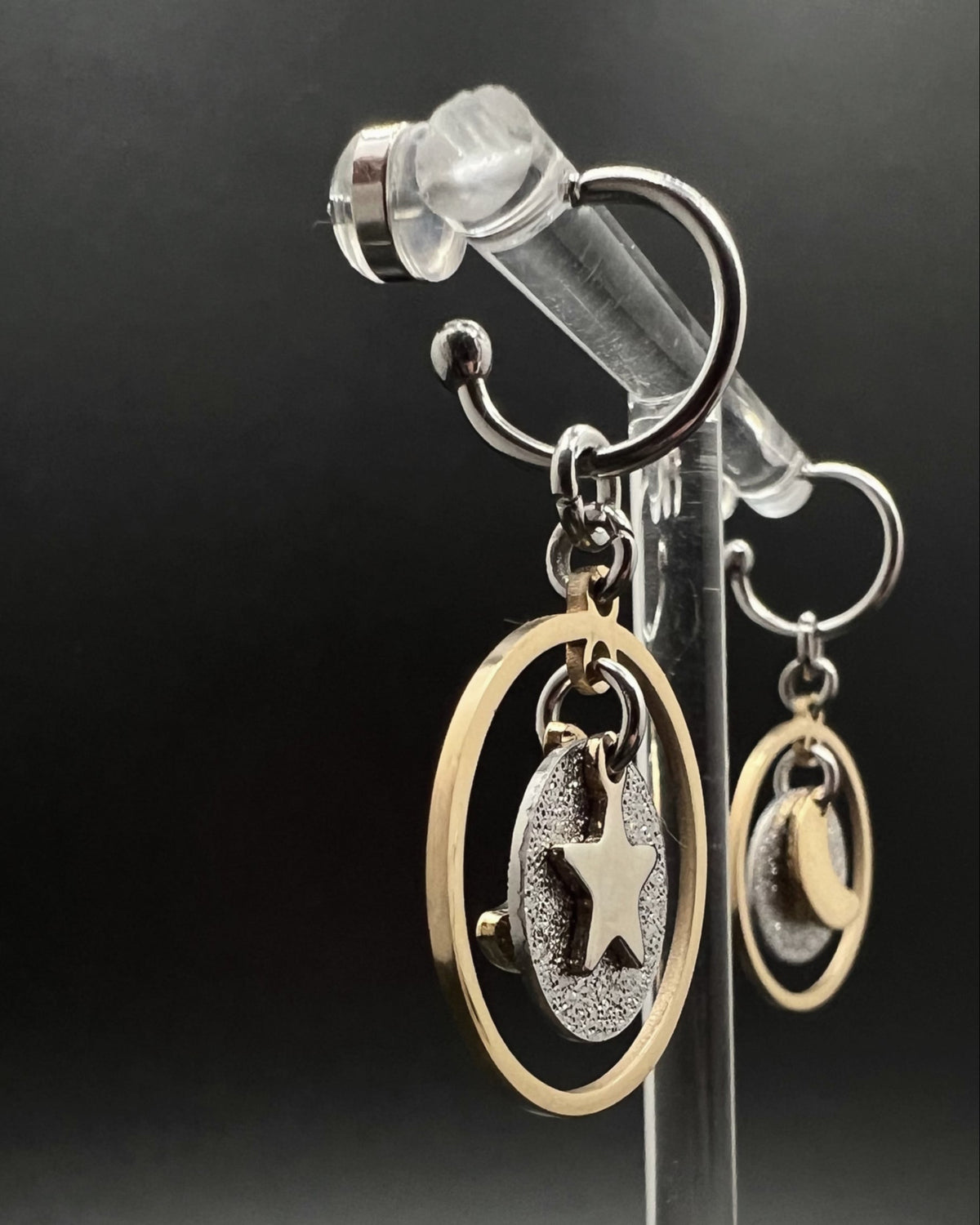 Mixed-metal stainless steel hoop earrings with detachable gold and silver moon and star charms and a textured disc in a 20 mm ring from Lawless Jewellery
