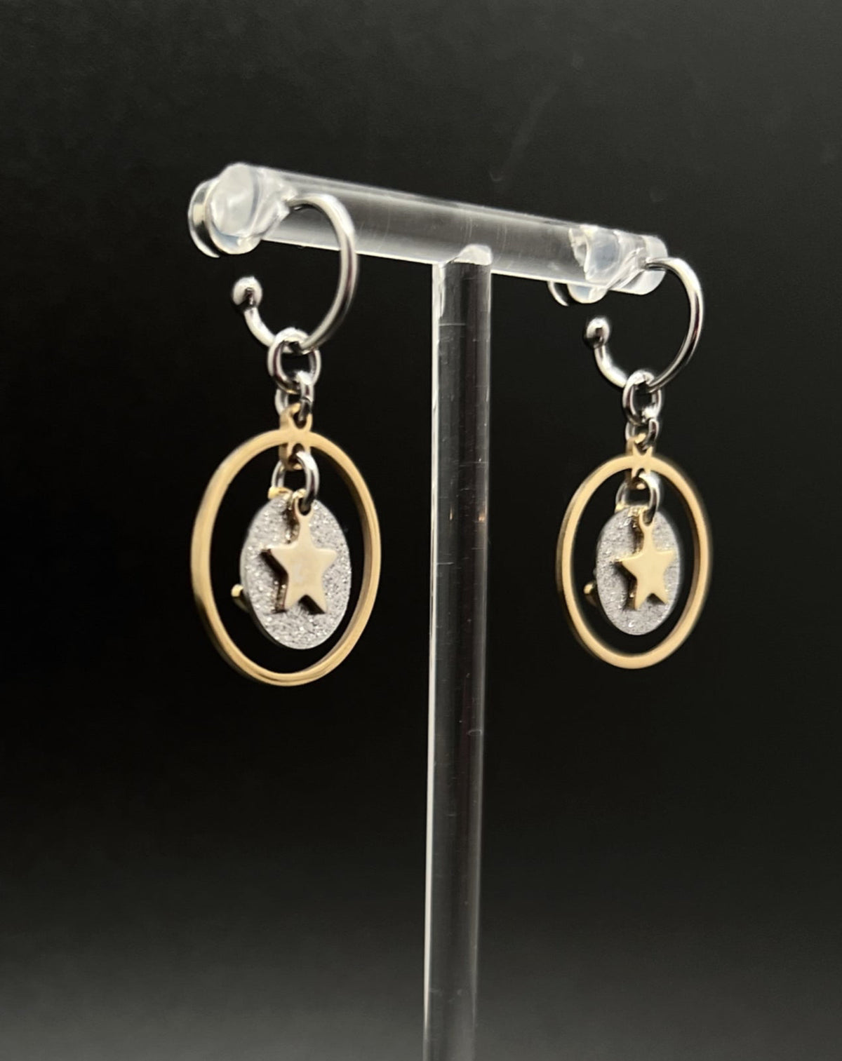 Mixed-metal stainless steel hoop earrings with detachable gold and silver moon and star charms and a textured disc in a 20 mm ring from Lawless Jewellery
