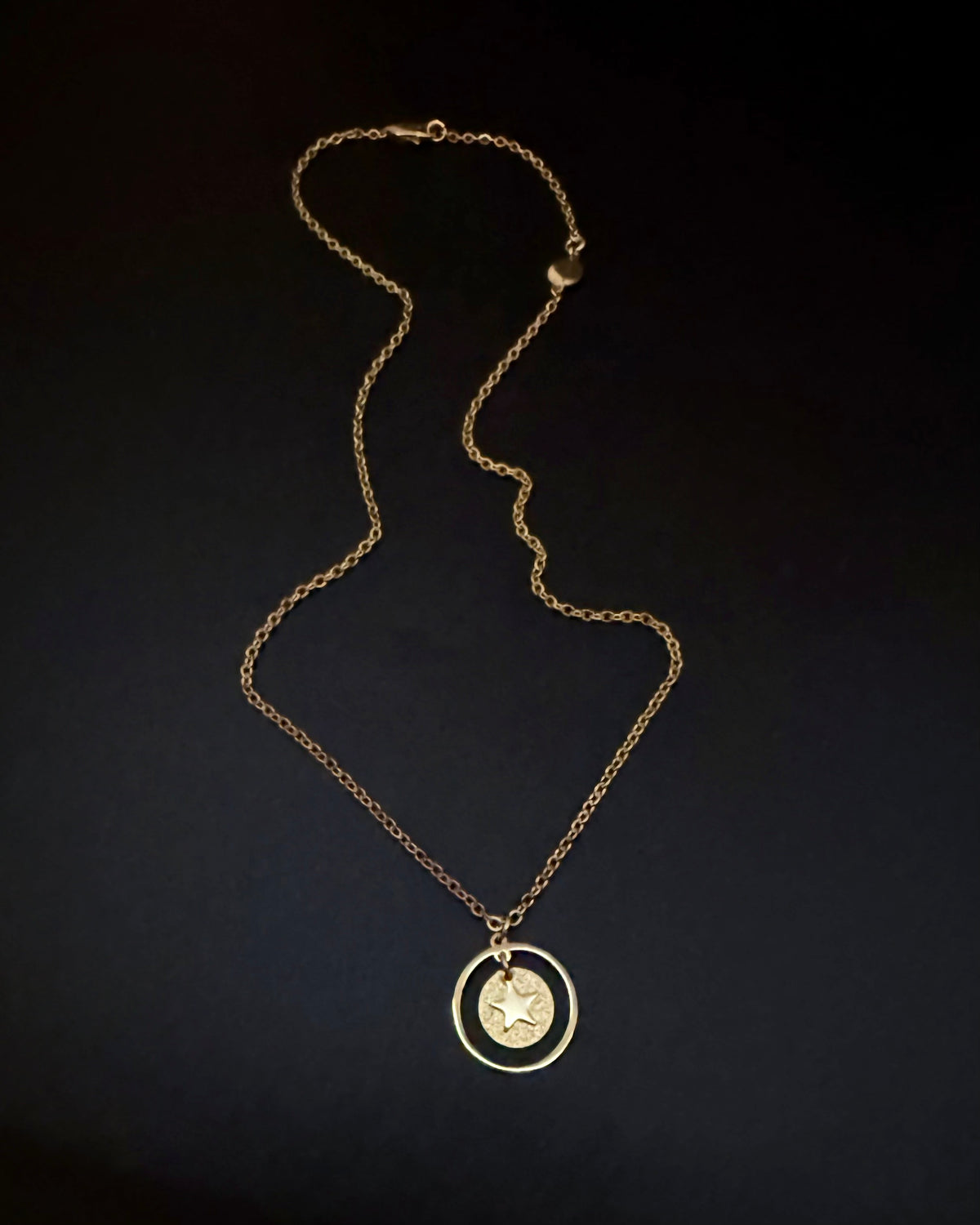 All gold reversible necklace with detachable moon and star charms, celestial pendant design in gold stainless steel, Urania Shapeshifter Necklace by Lawless Jewellery.