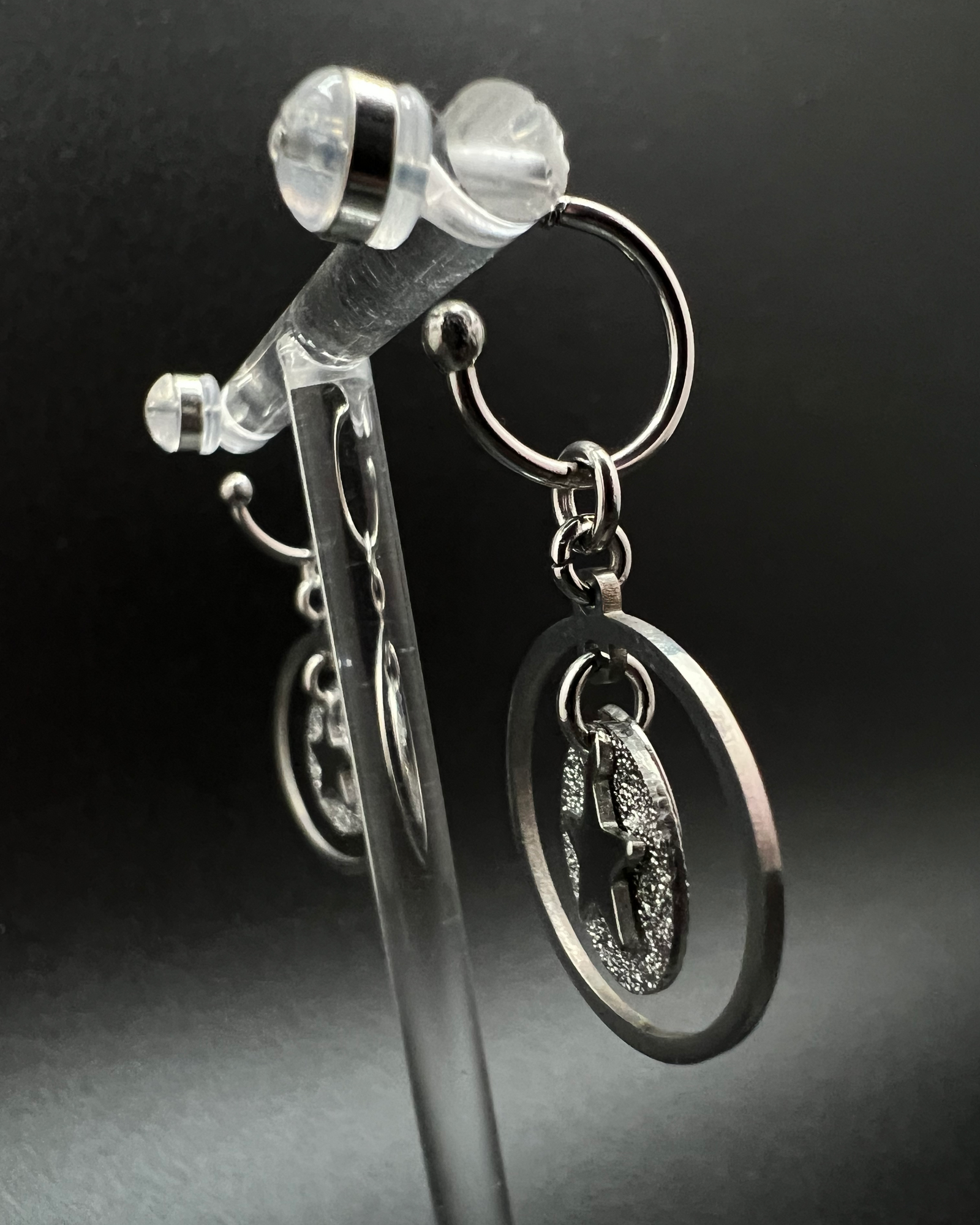 Silver stainless steel hoop earrings with detachable moon and star charms and a textured disc inside a 20 mm ring, 4 cm drop — Lawless Jewellery